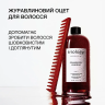 Клюквенный уксус для волос Triology.